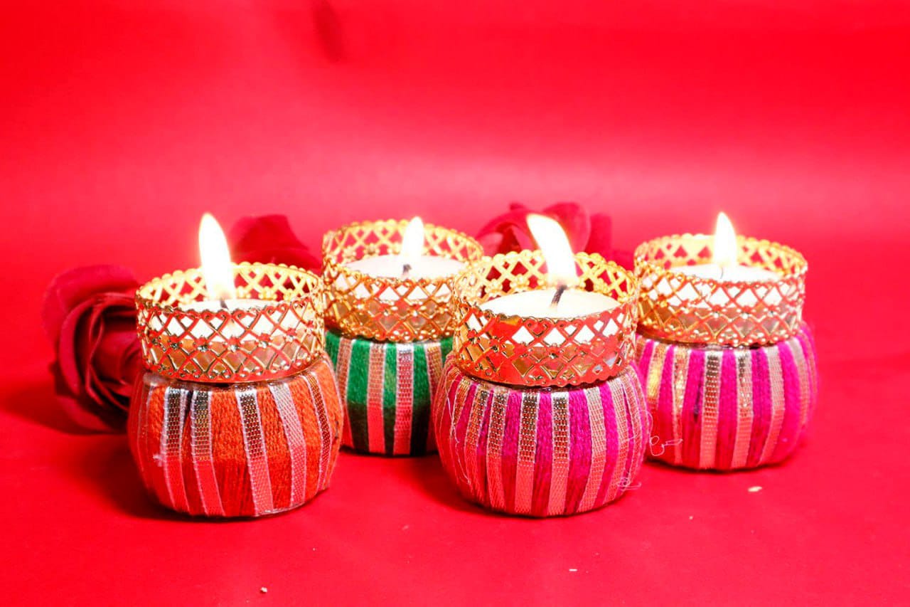 Handcrafted Multi Colour Damroo Shape Holding Tea  Light Holder