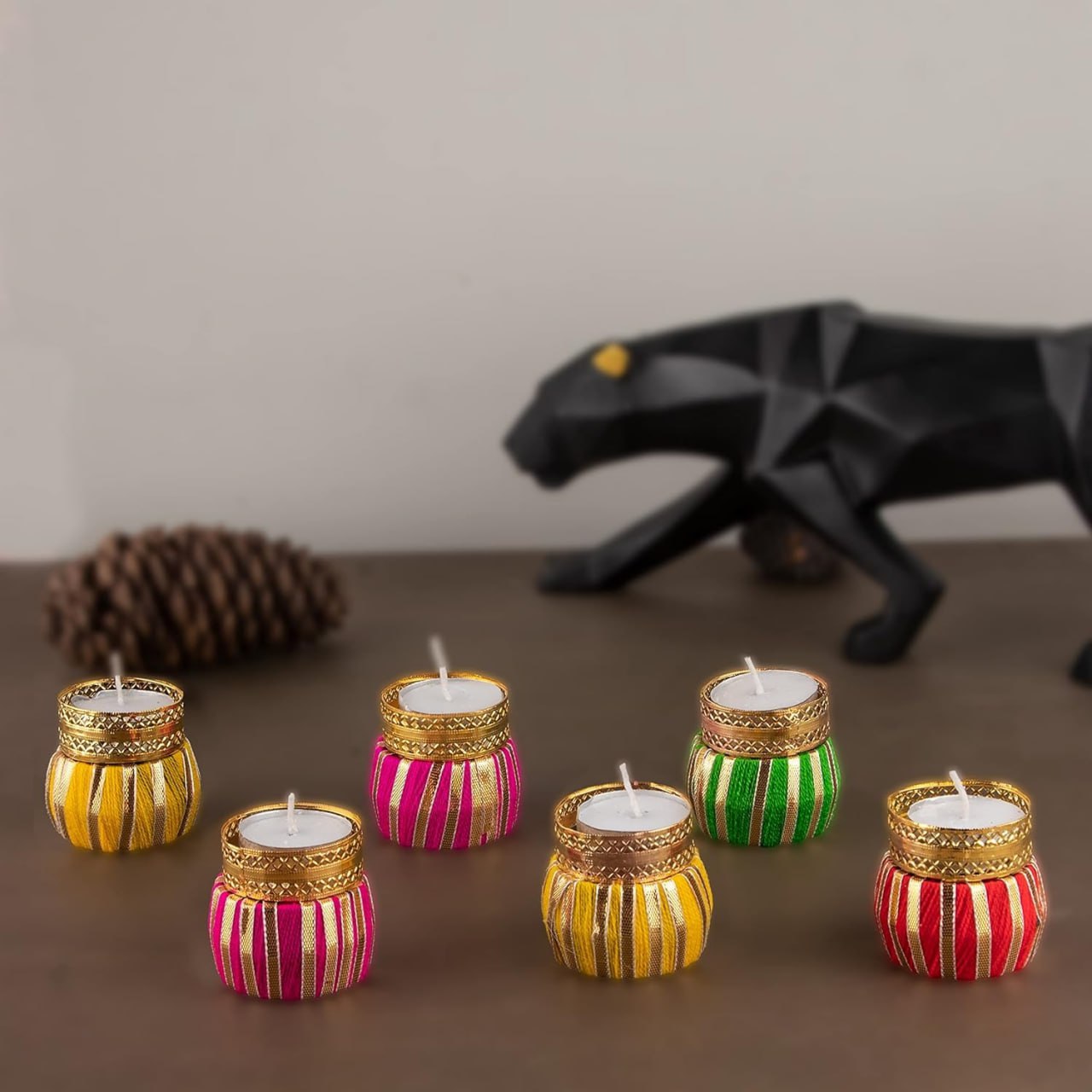 Handcrafted Multi Colour Damroo Shape Holding Tea  Light Holder